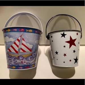 2 SMALL DECORATIVE METAL SUMMER/PATRIOTIC PAILS.
